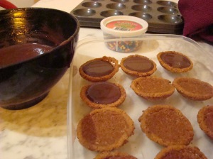 Chocolate tarts being filled