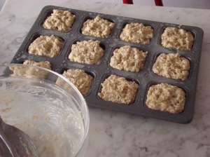 Muffin batter in tray